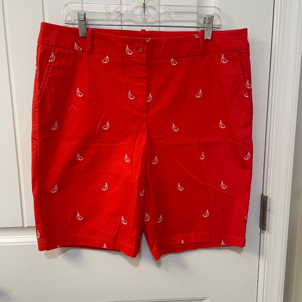Coral color with white sail boats.  Talbots